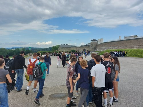 Pupils in front of the Mauthausen Memorial